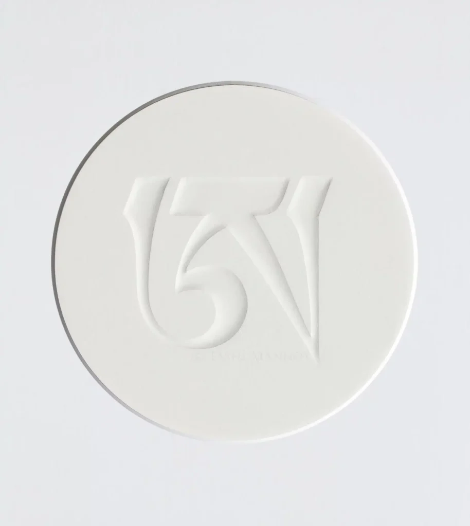 Embossed Ah, in round mount